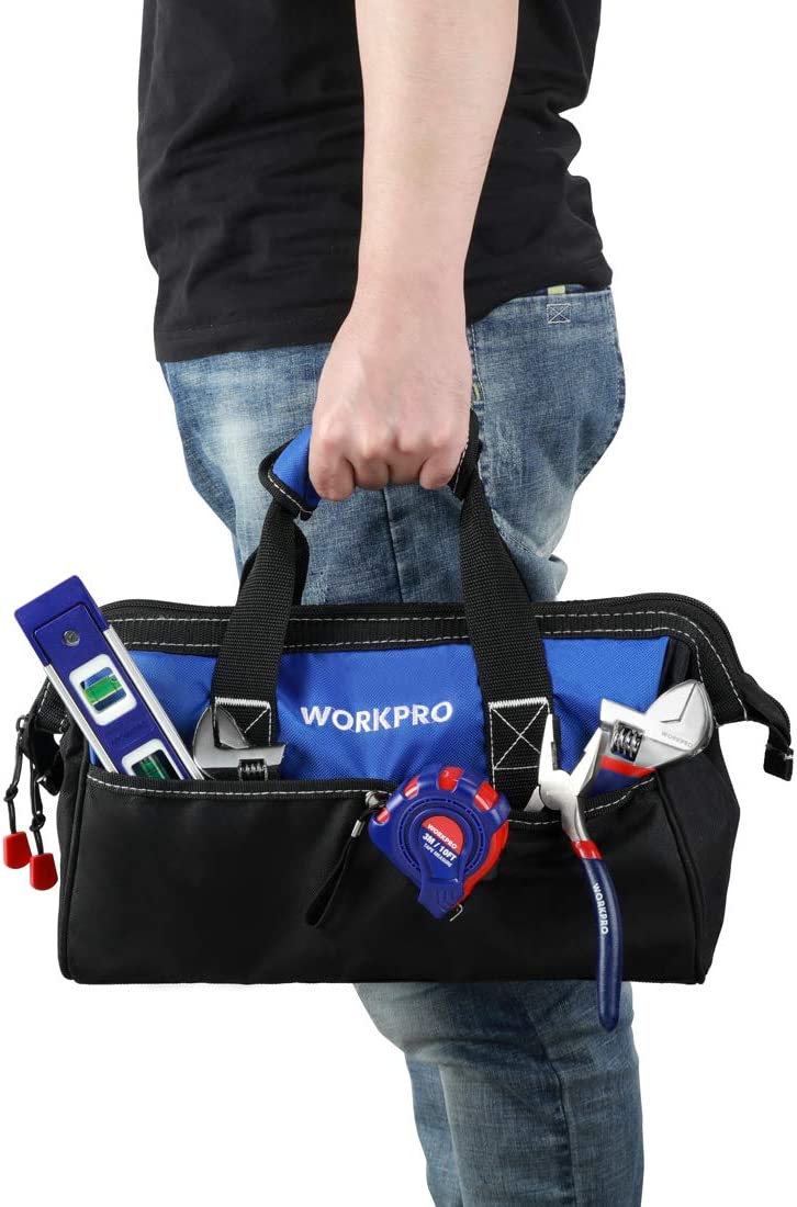Blue-and-black tool bag held by a person with screwdrivers and small tools visible