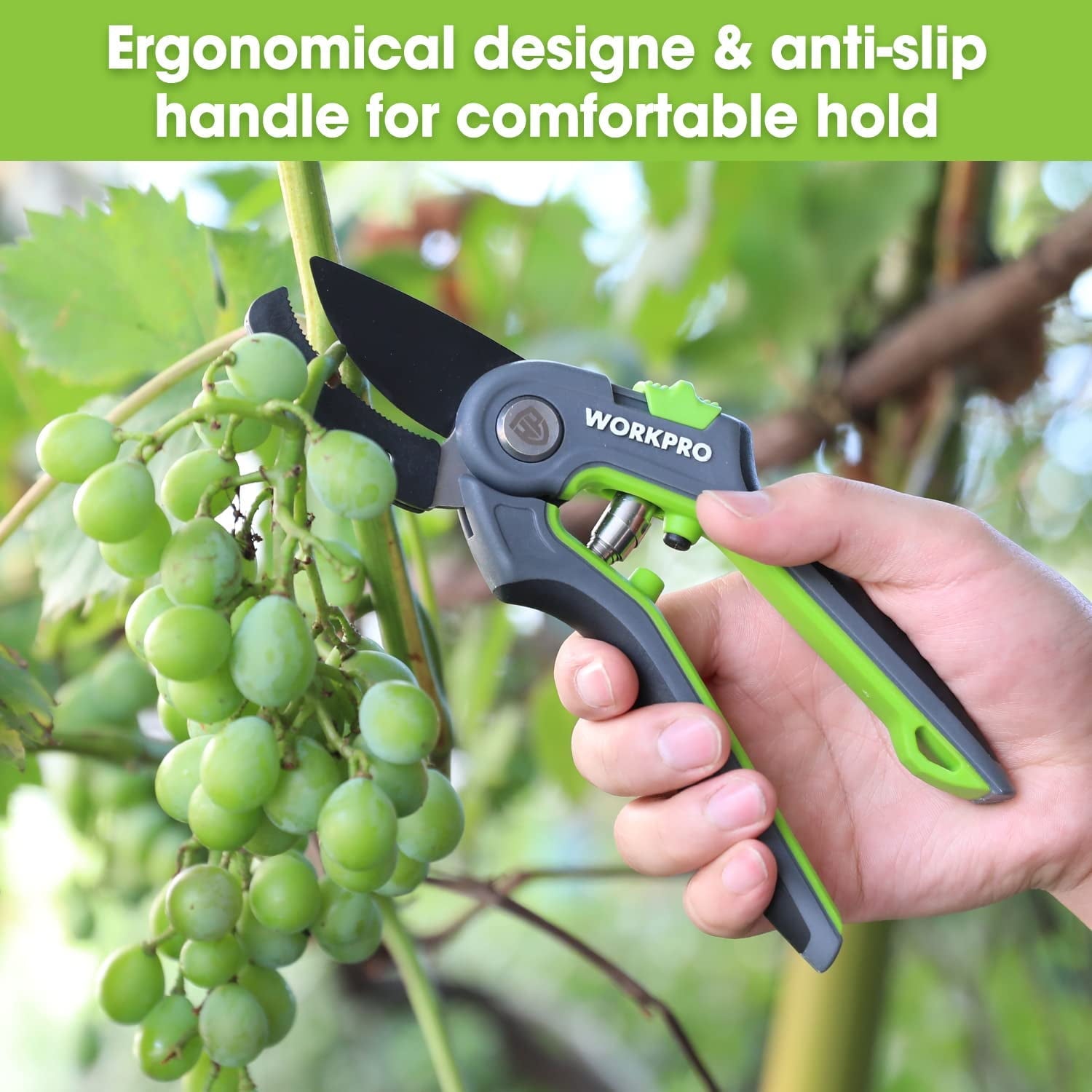 Ergonomic green-and-black pruning shears with anti-slip handle, held by a hand