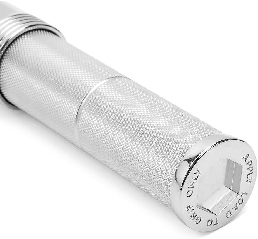 Knurled ergonomic handle with torque markings and smooth silver end cap.