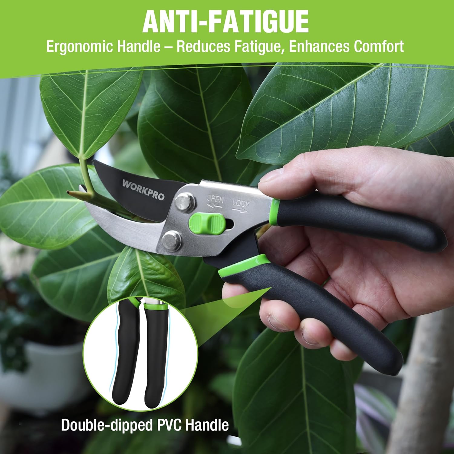 Bypass pruning shears with ergonomic black handle and green grip pads, near leafy plant