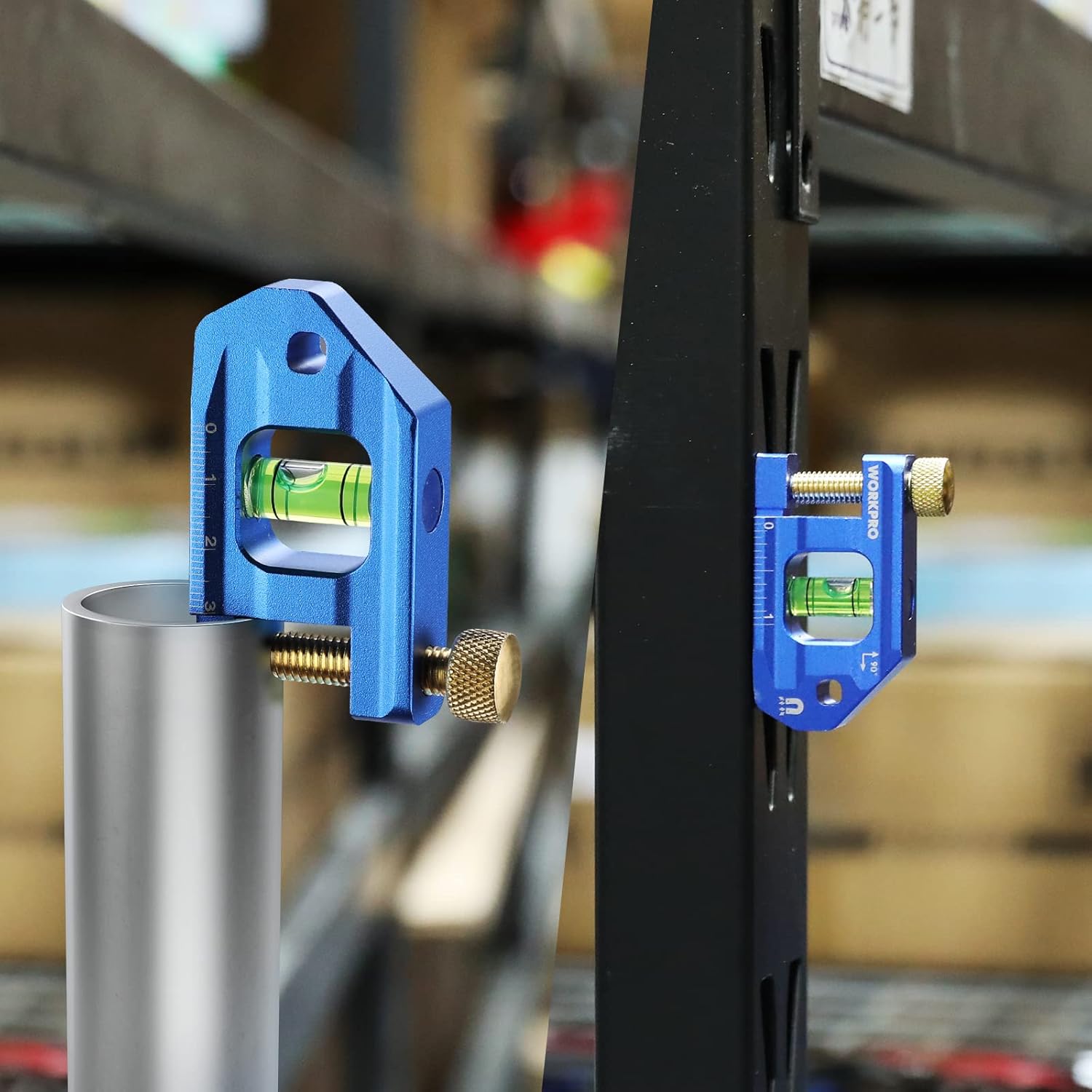 Blue magnetic conduit bending level mounted on metal support with green bubble vial