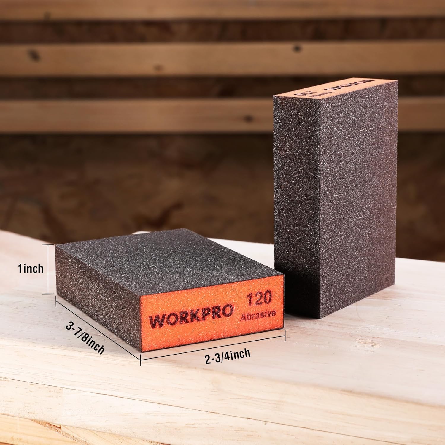 WORKPRO sanding sponge block, 120-grit orange label, on wood surface