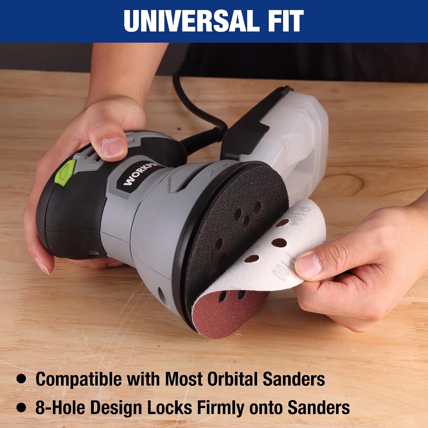 Orbital sander with a circular 8-hole sanding disc attached, ready to use
