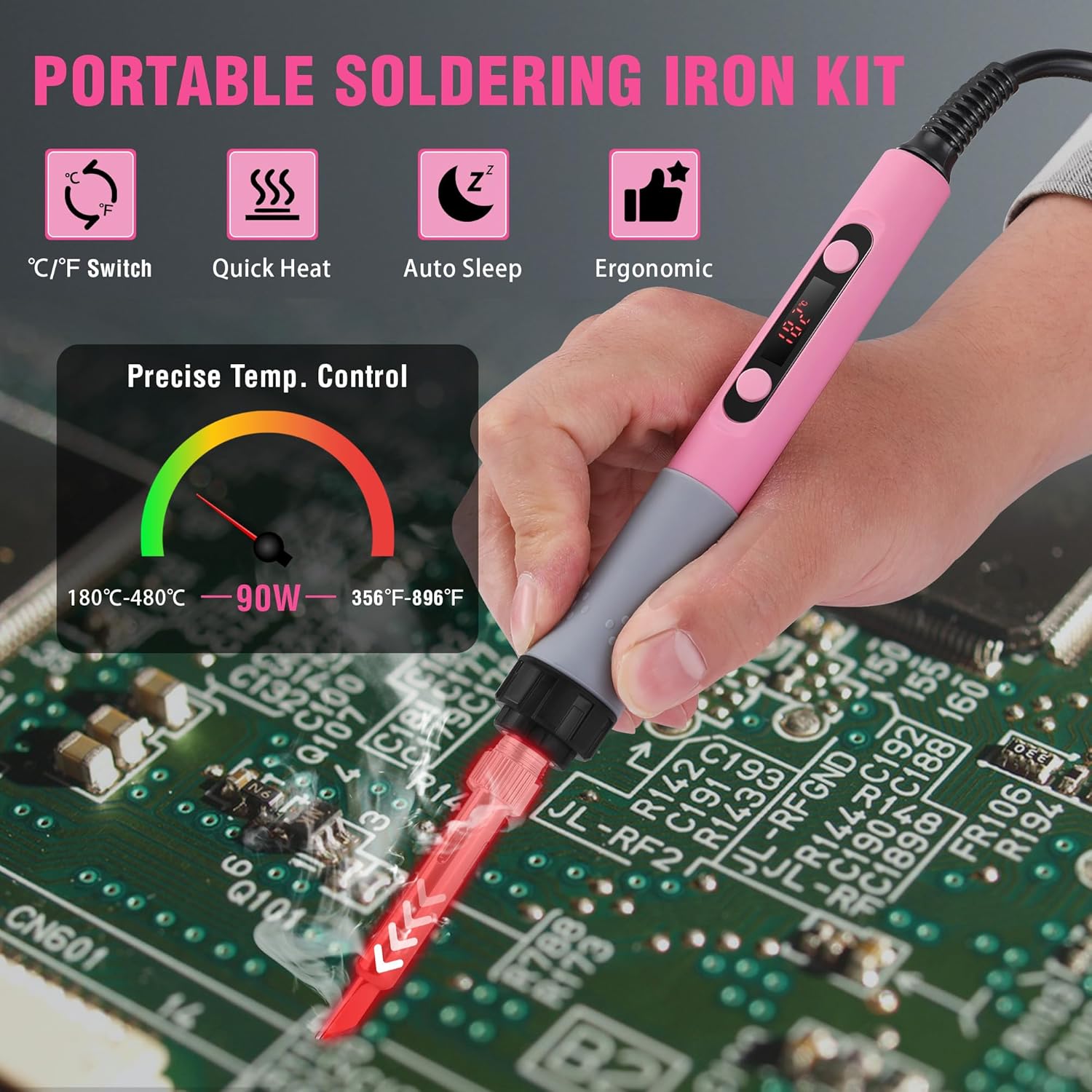 Pink soldering iron gun with soldering tip in hand, used on a circuit board