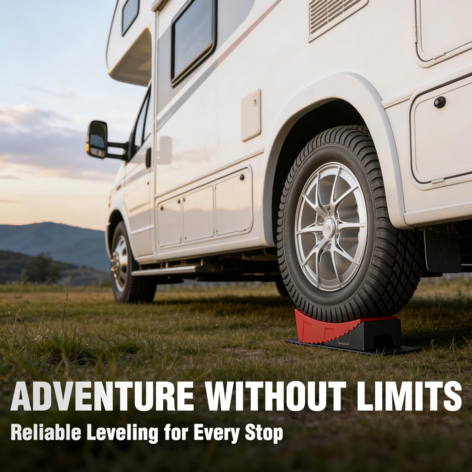 Red RV leveling block under camper wheel for stable leveling on grass