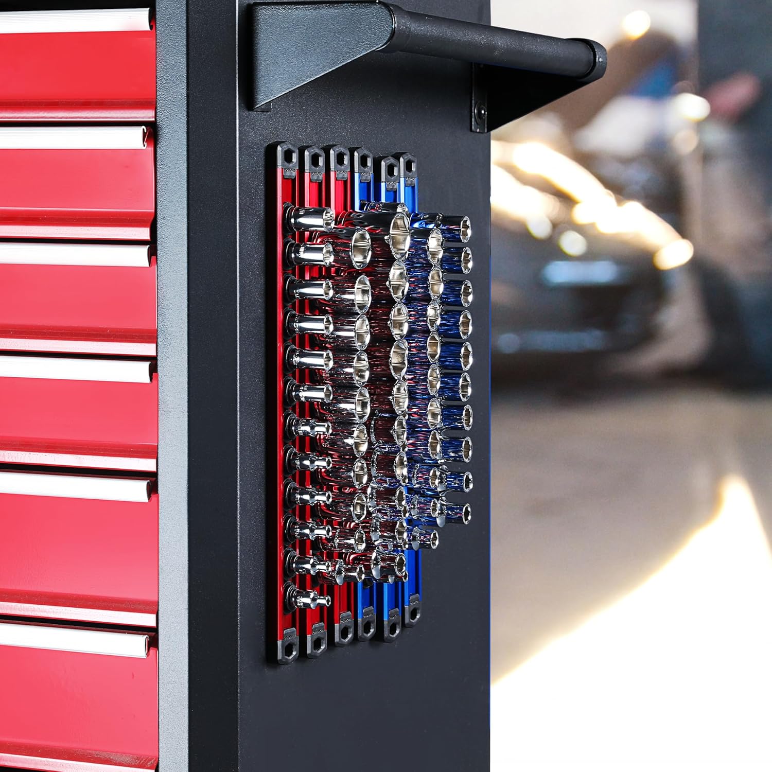 Metal socket rail panel with blue and red clips holding chrome sockets