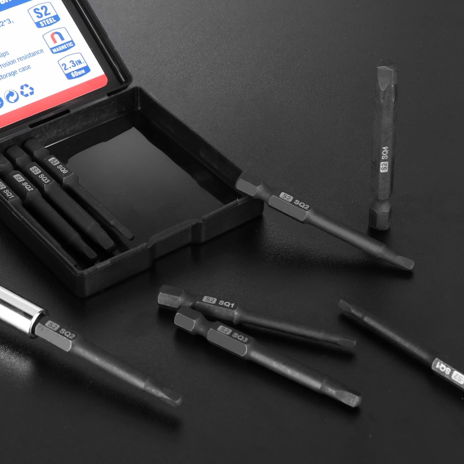 Square screwdriver bits in black storage tray, 1/4 in hex shanks visible