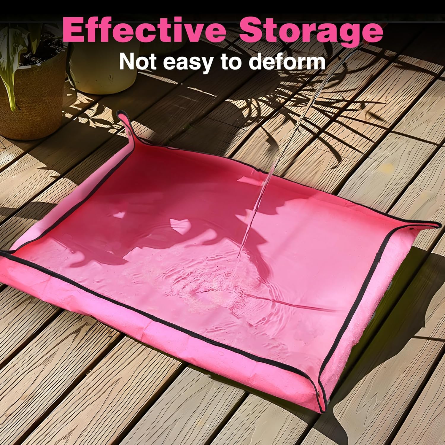Large pink potting mat with raised waterproof surface and black edge on a wooden deck