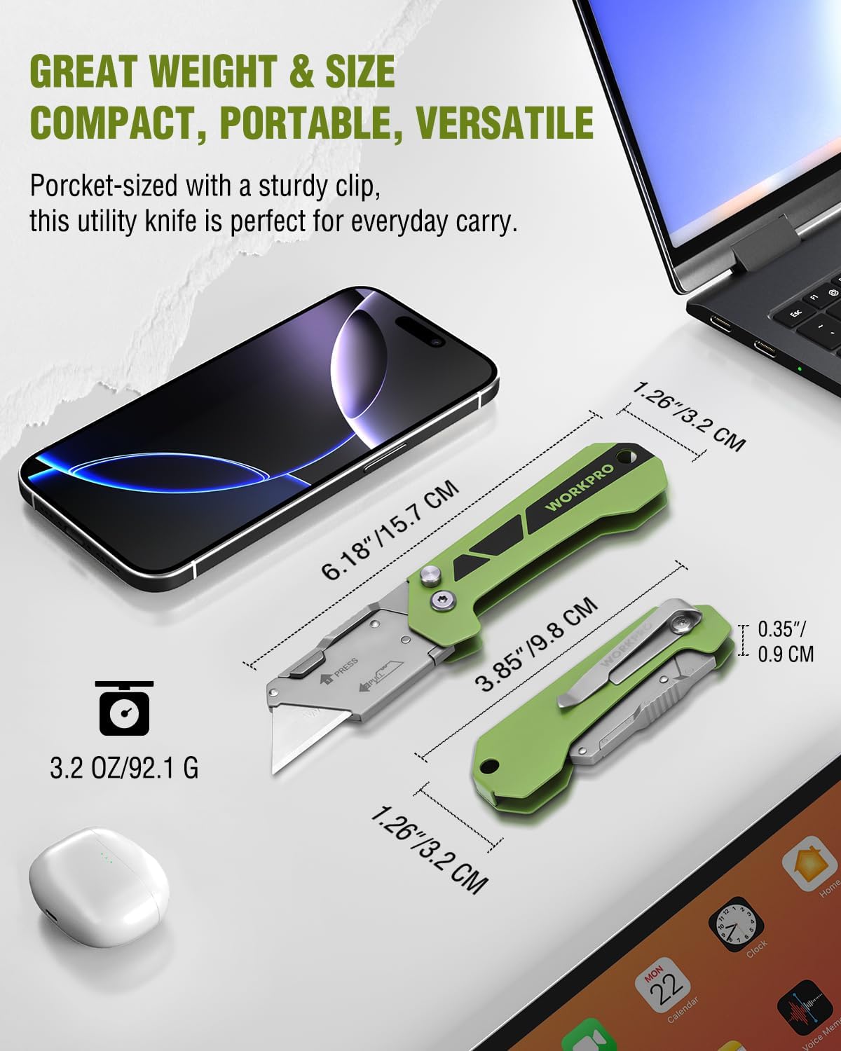 Green folding utility knife with belt clip and extended snap blade, quick-change design