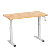 Adjustable height workbench with light wood tabletop and gray steel legs