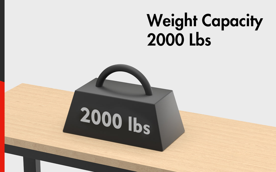 Black weight capacity 2000 lbs box with handle on a wooden surface, showing 2000 lbs text