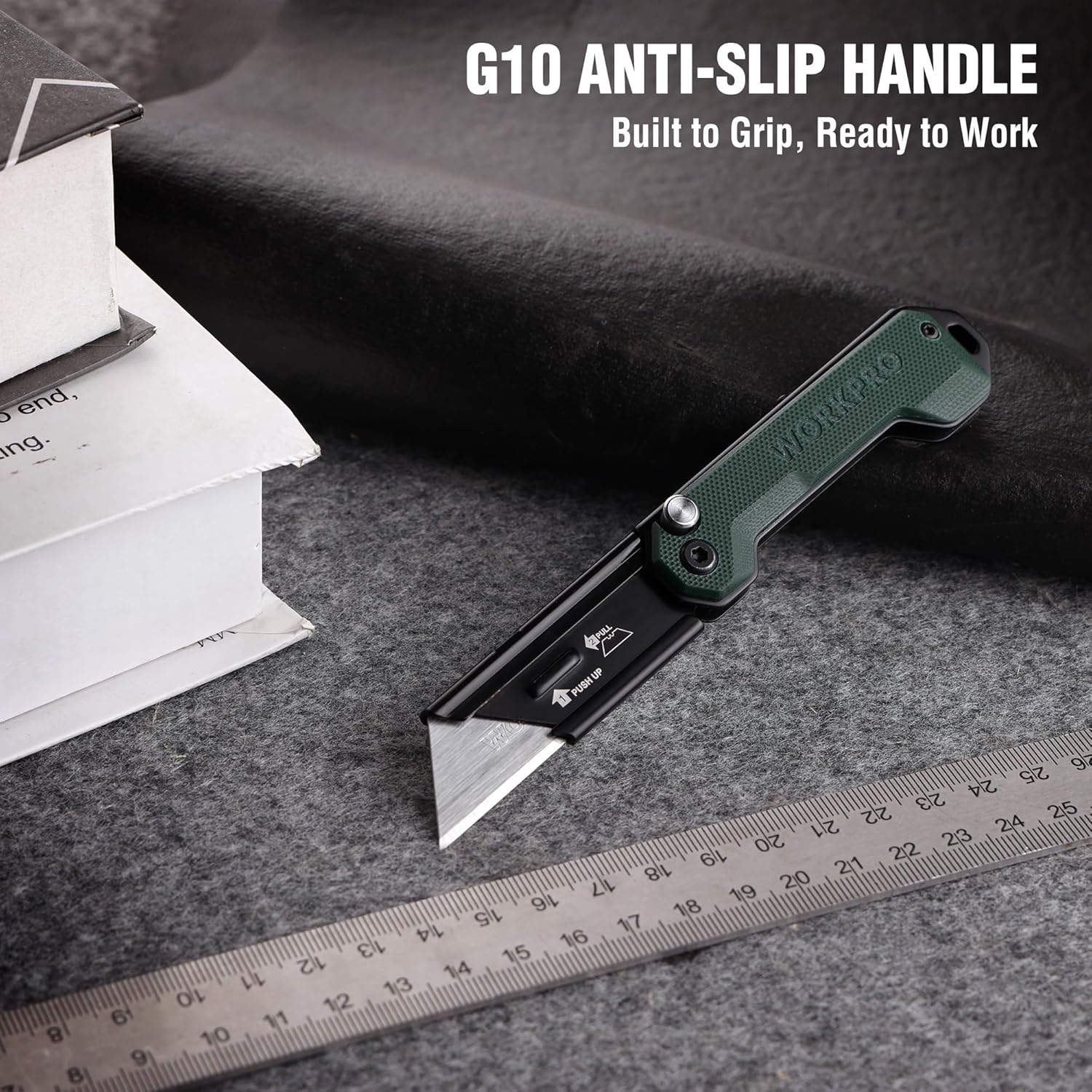 Folding utility knife with green G10 handle, black blade, and belt clip