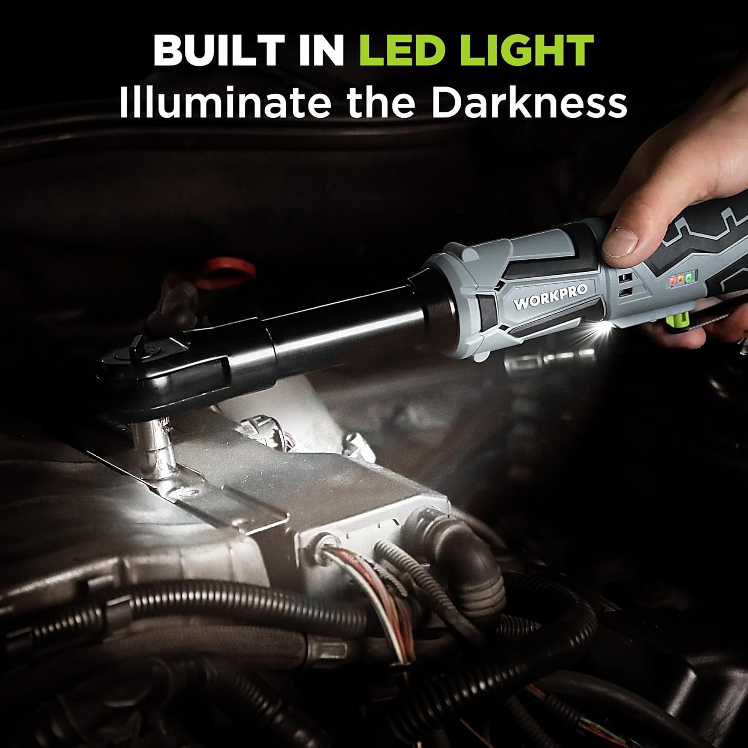 WORKPRO cordless power ratchet wrench with built-in LED light illuminating a fastener