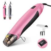 Pink mini hot air gun with reflector nozzle, black handle, and retractable stand