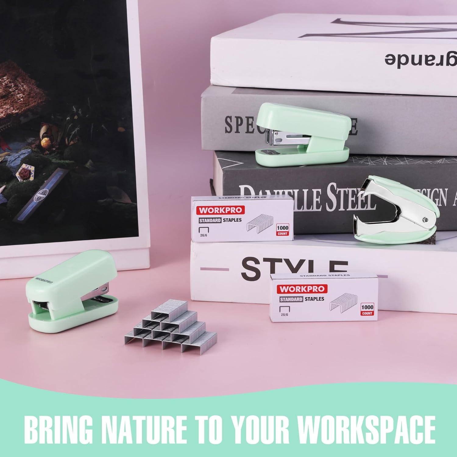Green mini stapler on desk beside boxes of WORKPRO staples
