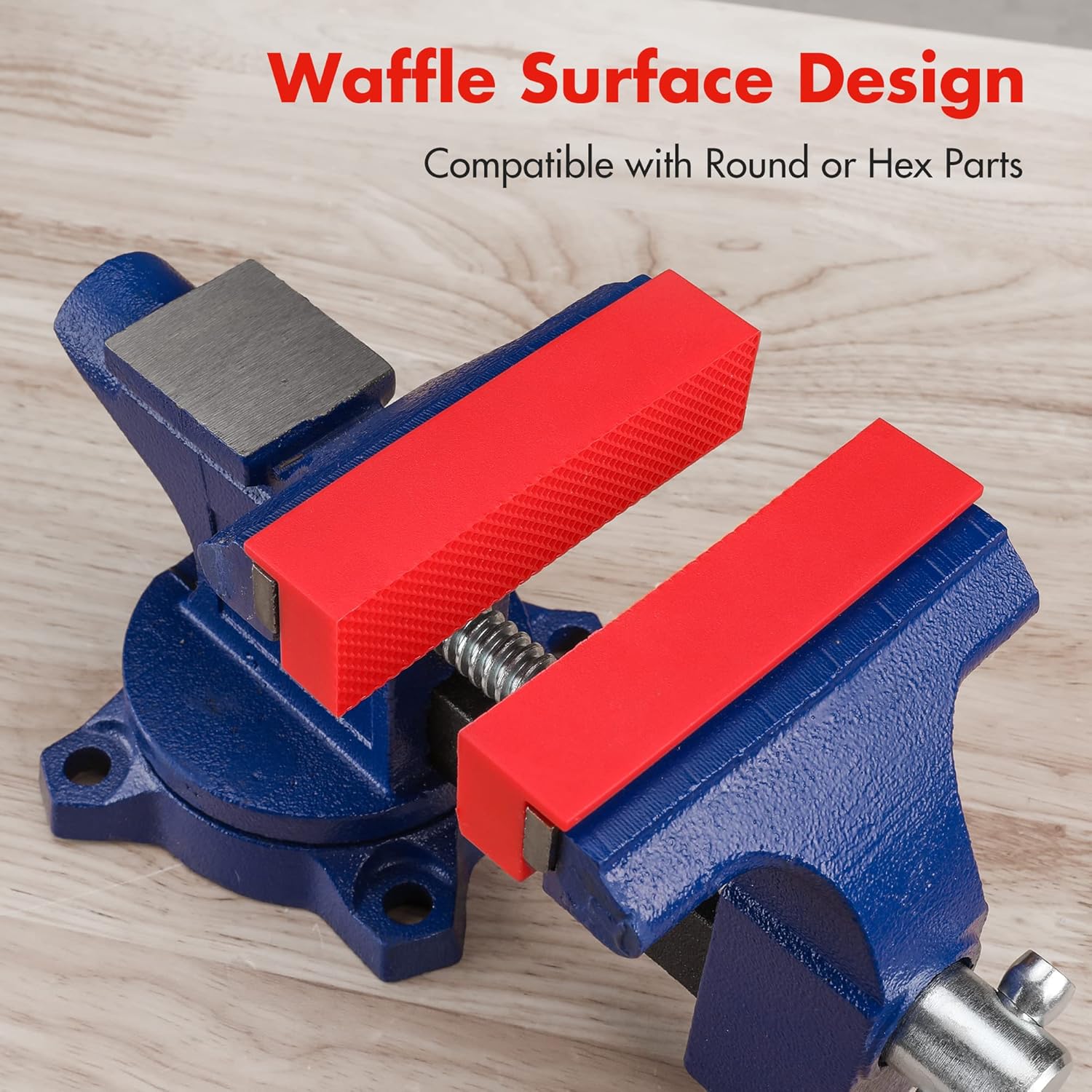 Vise jaw protective pads with red waffle surface inserts on blue clamp bodies