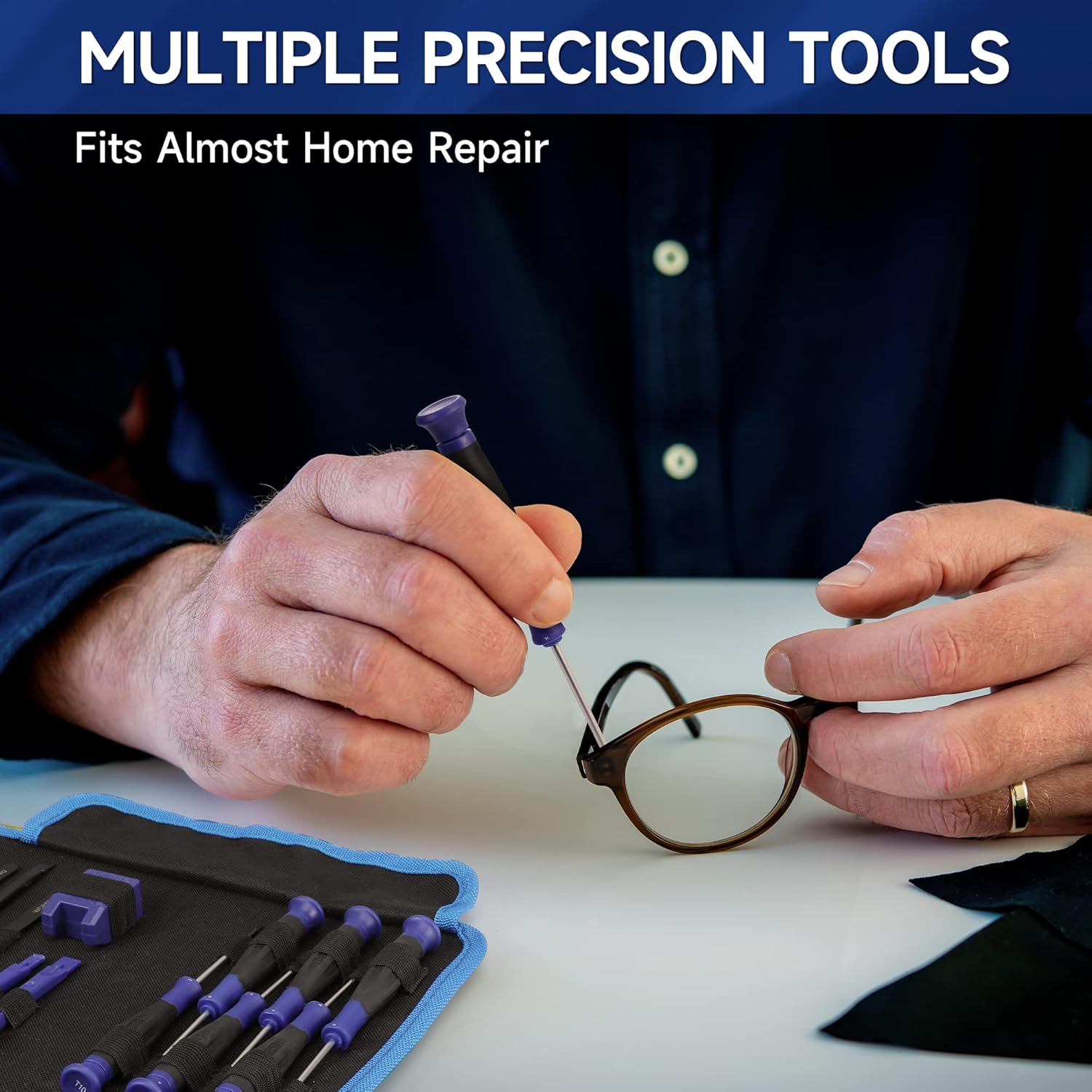 Precision magnetic screwdriver adjusting eyeglass frame with blue-handled bits nearby