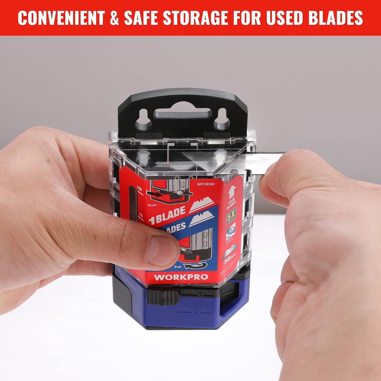Hands storing used utility knife blades in clear TAC SK2M dispenser