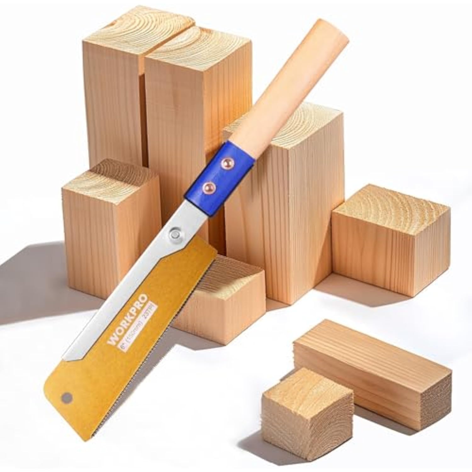 Japanese pull saw with beech handle and yellow blade, shown beside wooden blocks