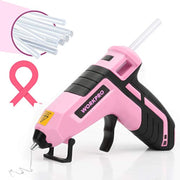Pink mini cordless glue gun showing glue sticks feeding into the nozzle