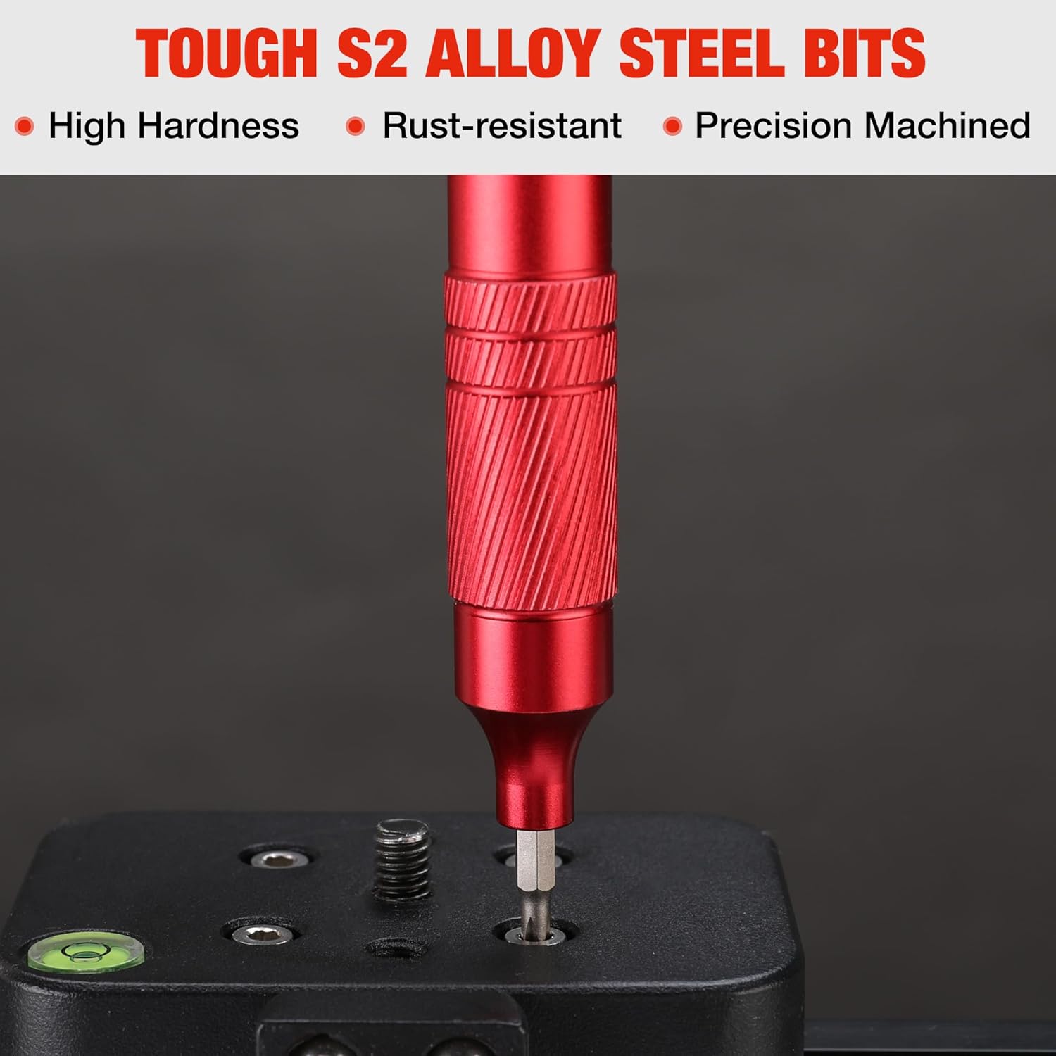 Red knurled mini screwdriver with installed metal driver bit tip