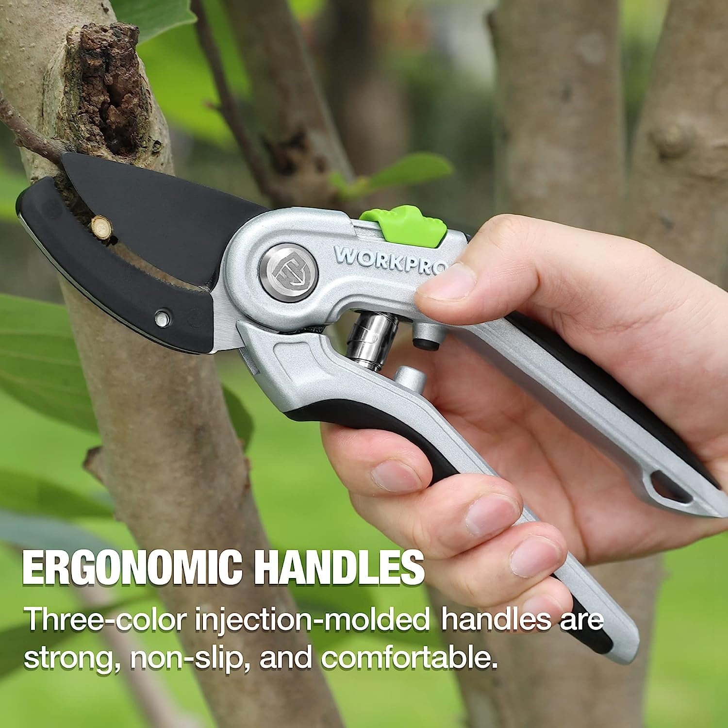 Anvil pruning shears in hand trimming branches with ergonomic non-slip handle