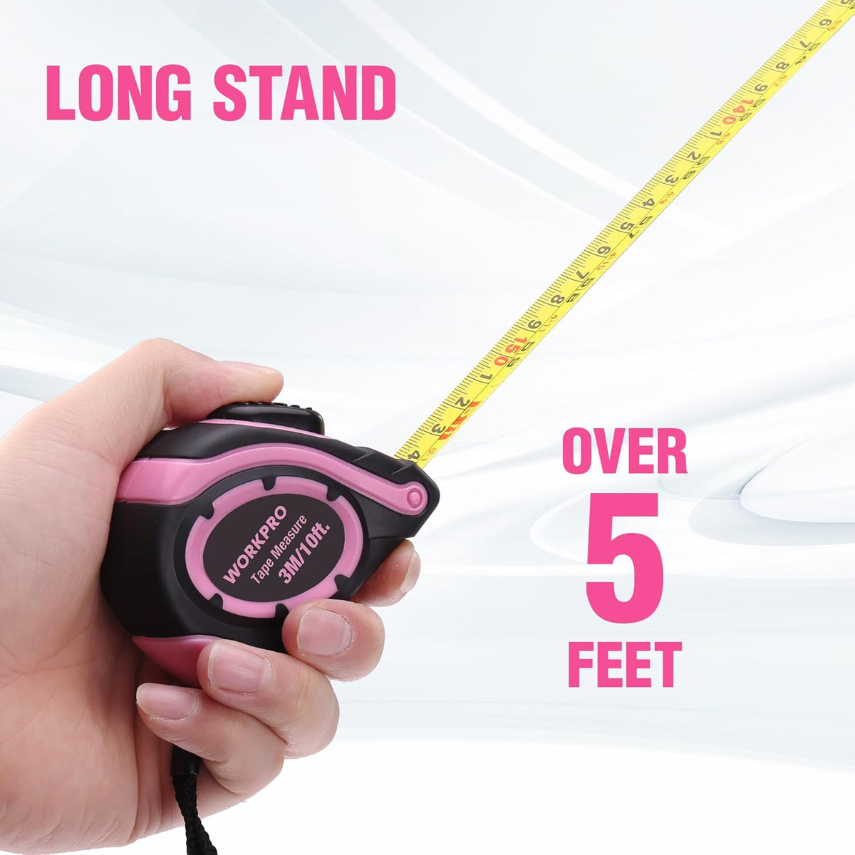 Pink WORKPRO tape measure held in hand, showing over 5 feet extension