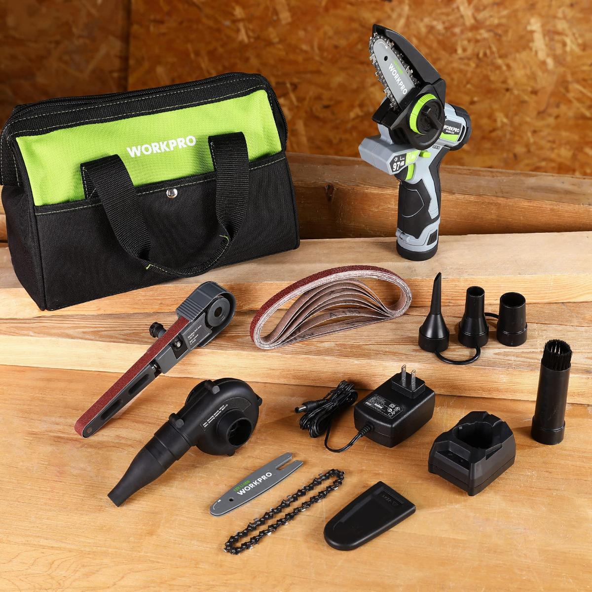 Cordless 3-in-1 tool set in black and green bag with sander, chain saw, blower, and nozzles