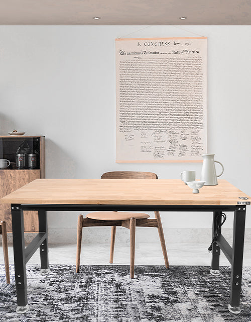 Minimal office desk with chair, rug, coffee mug, and framed document on the wall, innovation and quality shown