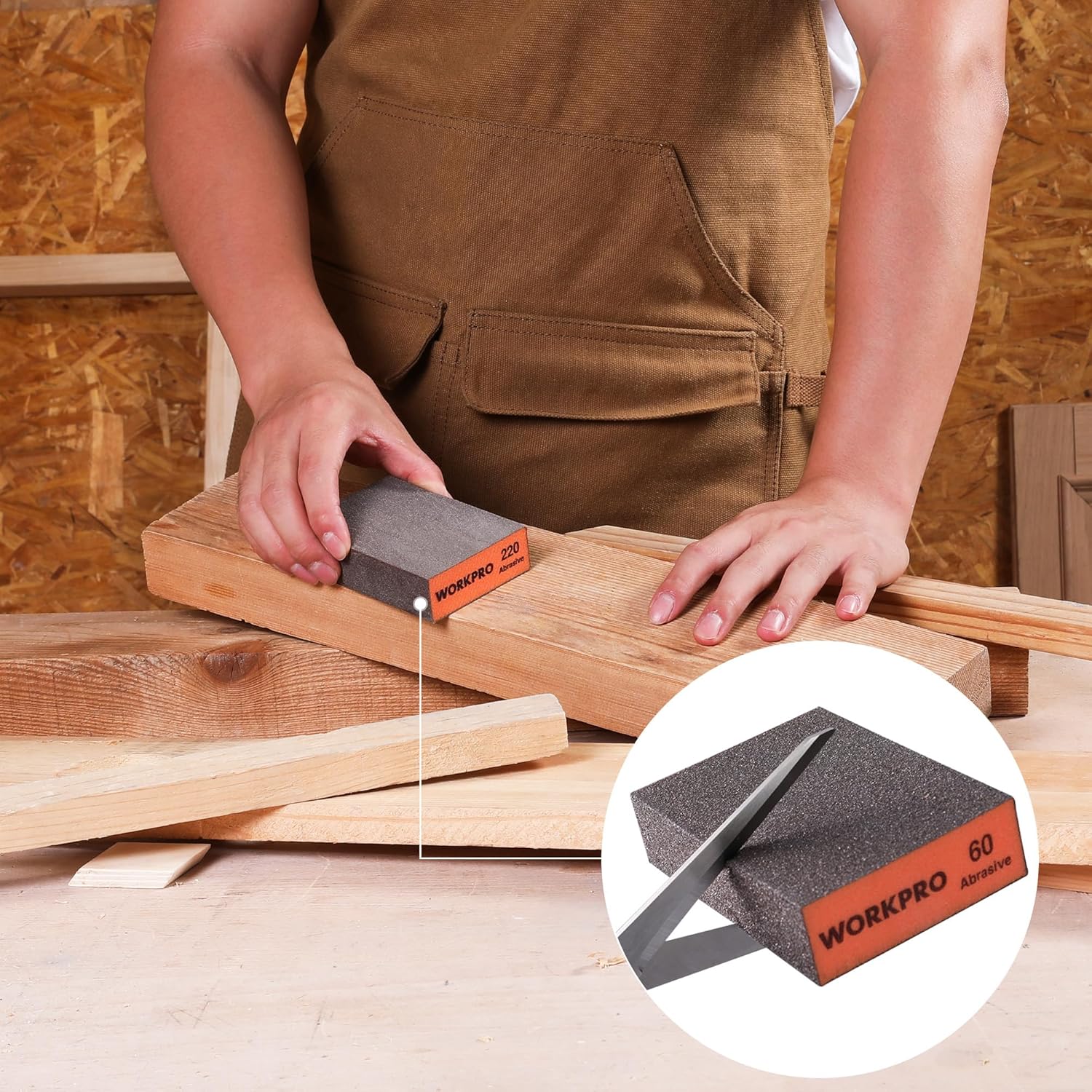 WORKPRO sanding sponge block pressing against wood plank, 60-grit label visible