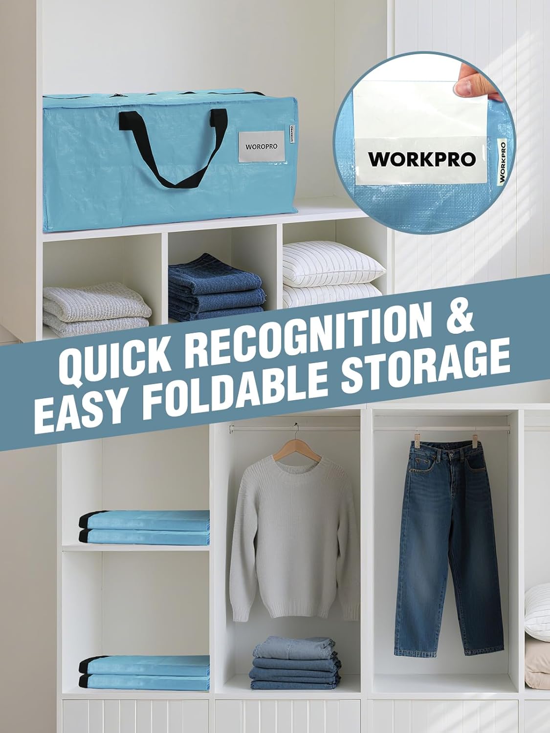 Dusty blue foldable storage tote placed on shelving with black handles and zipper.