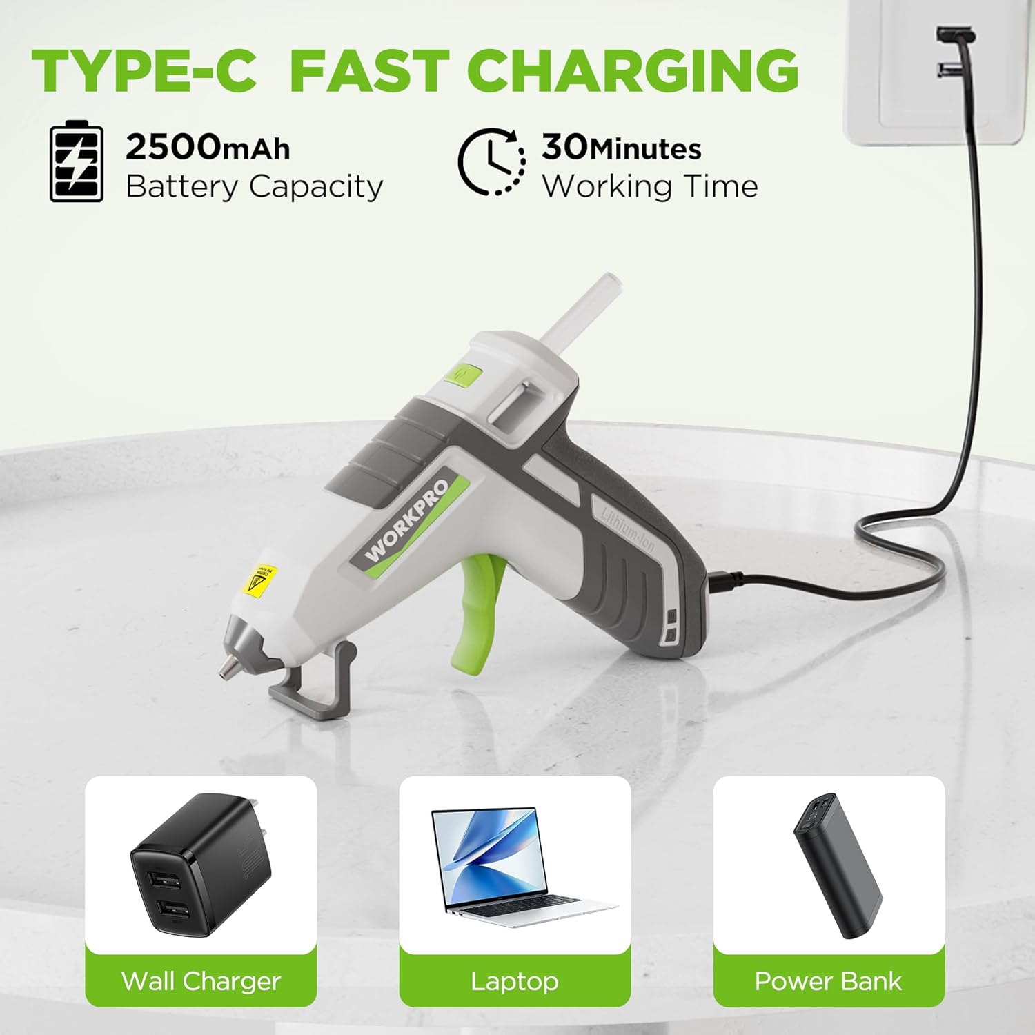 USB-C rechargeable hot glue gun with white and gray handle and black charging cable.