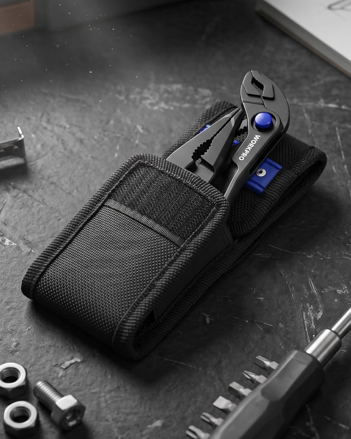 Black fabric pouch with mini pliers and long nose plier, blue accents on handles