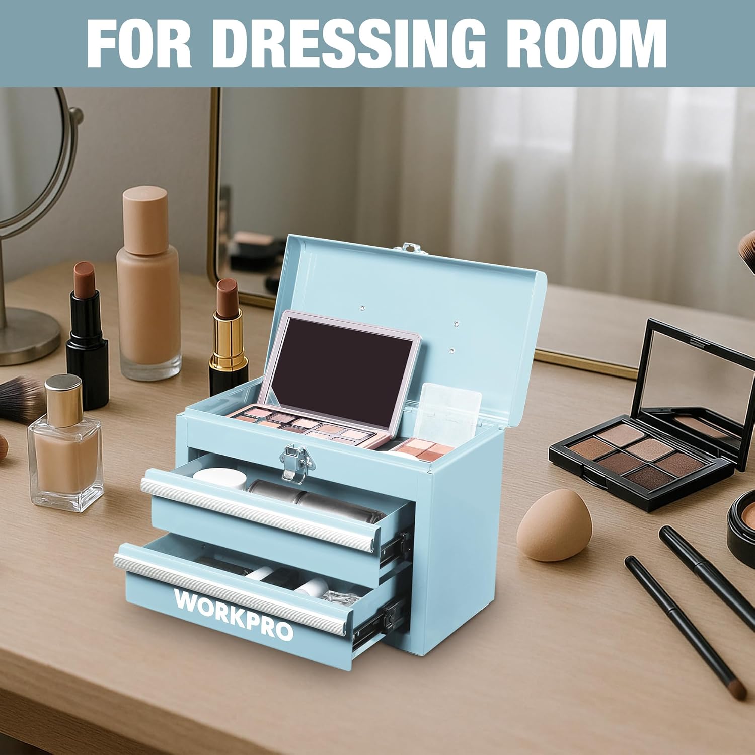 Light blue mini tool box open on a dresser, showing two drawers for organizing small items.