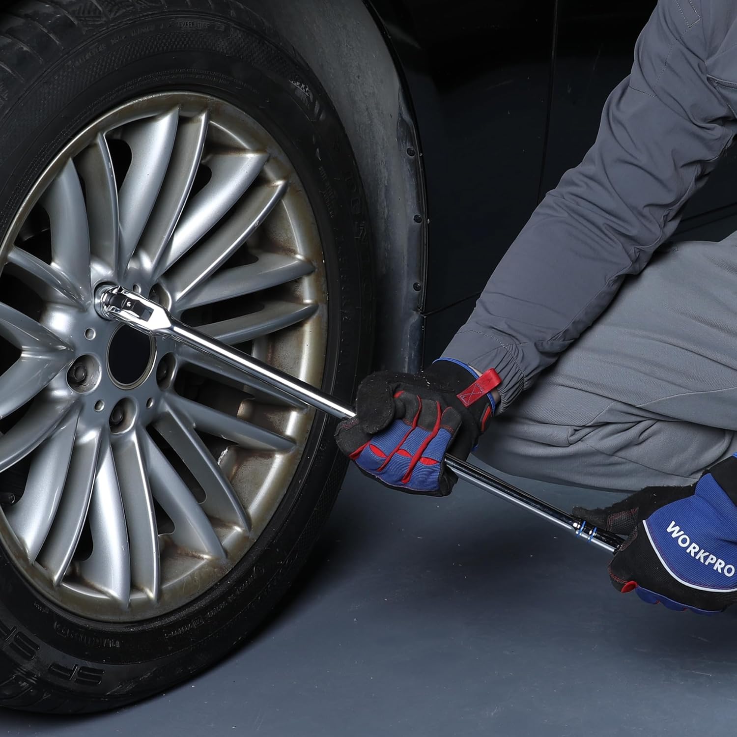 Breaker bar tool applying to a vehicle wheel lug area, chrome head with black grip