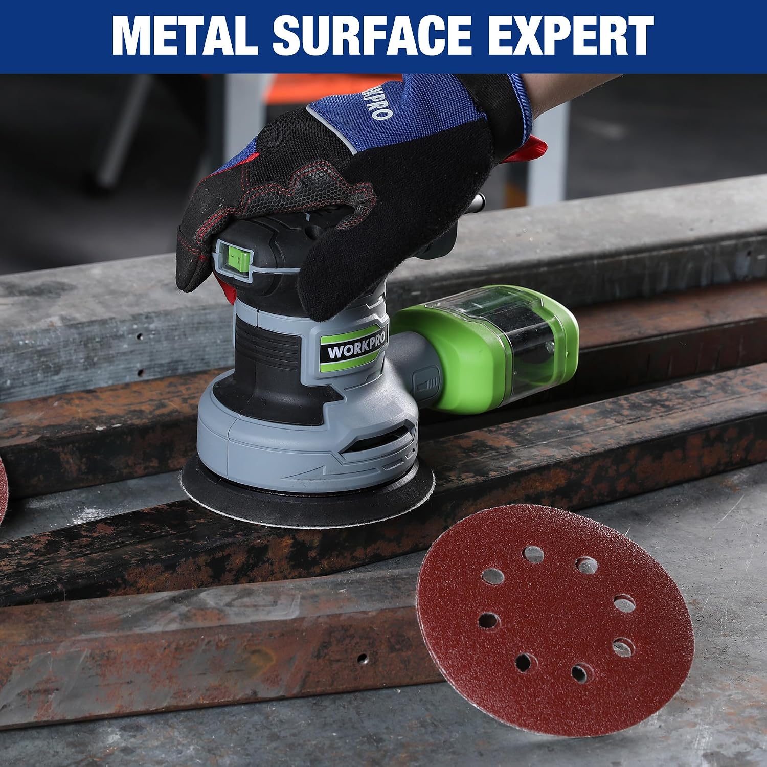 Orbital sander using a burgundy red 5-inch 8-hole hook-and-loop sanding disc