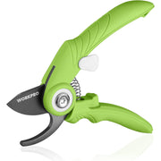 Green bypass pruning shears with black blades and white safety thumb pad