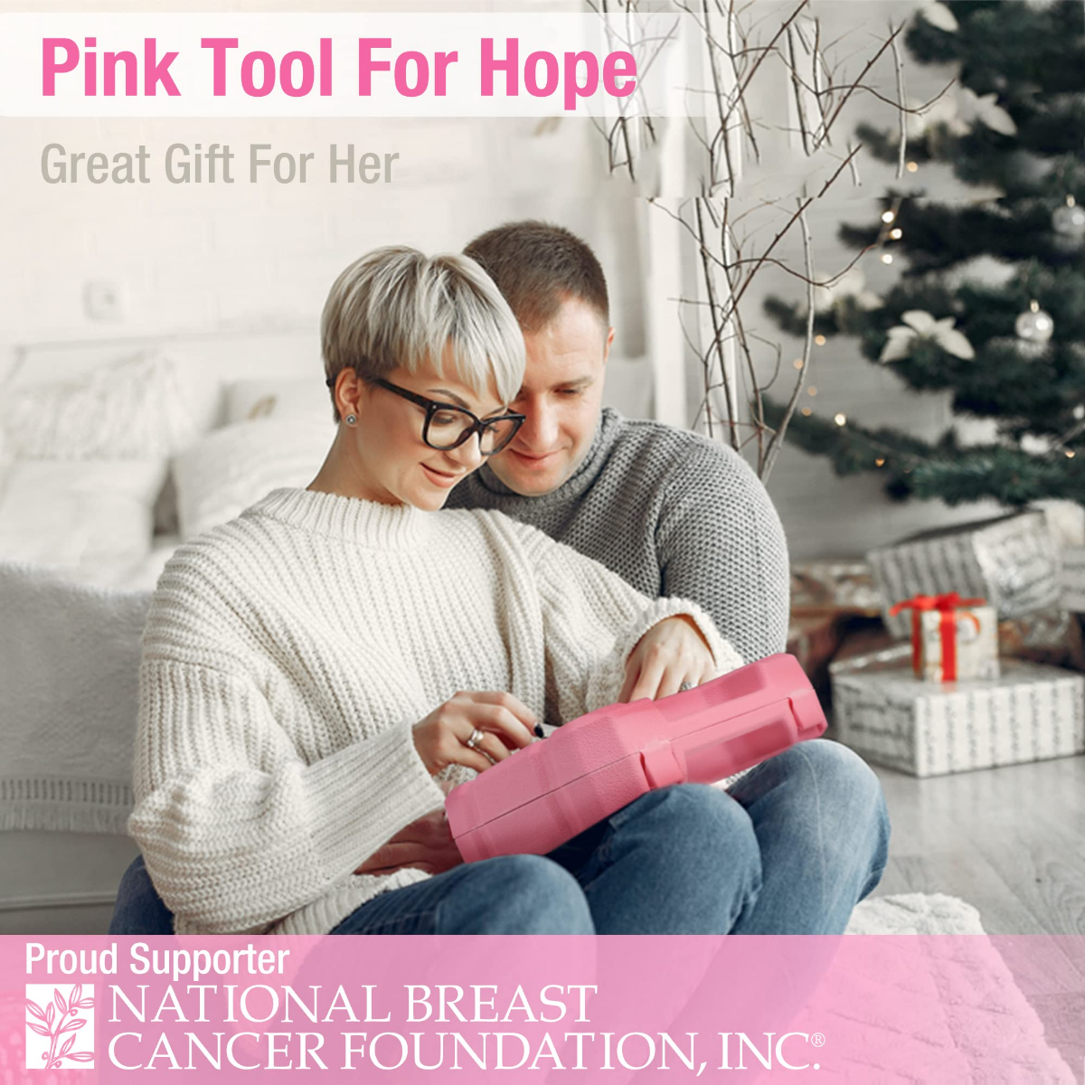 Pink cordless tool kit gift box held by two people on a sofa