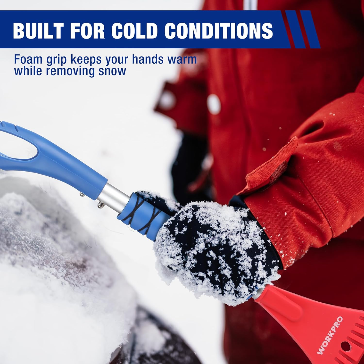 Snow brush and red ice scraper with foam-grip handle, shown with winter glove