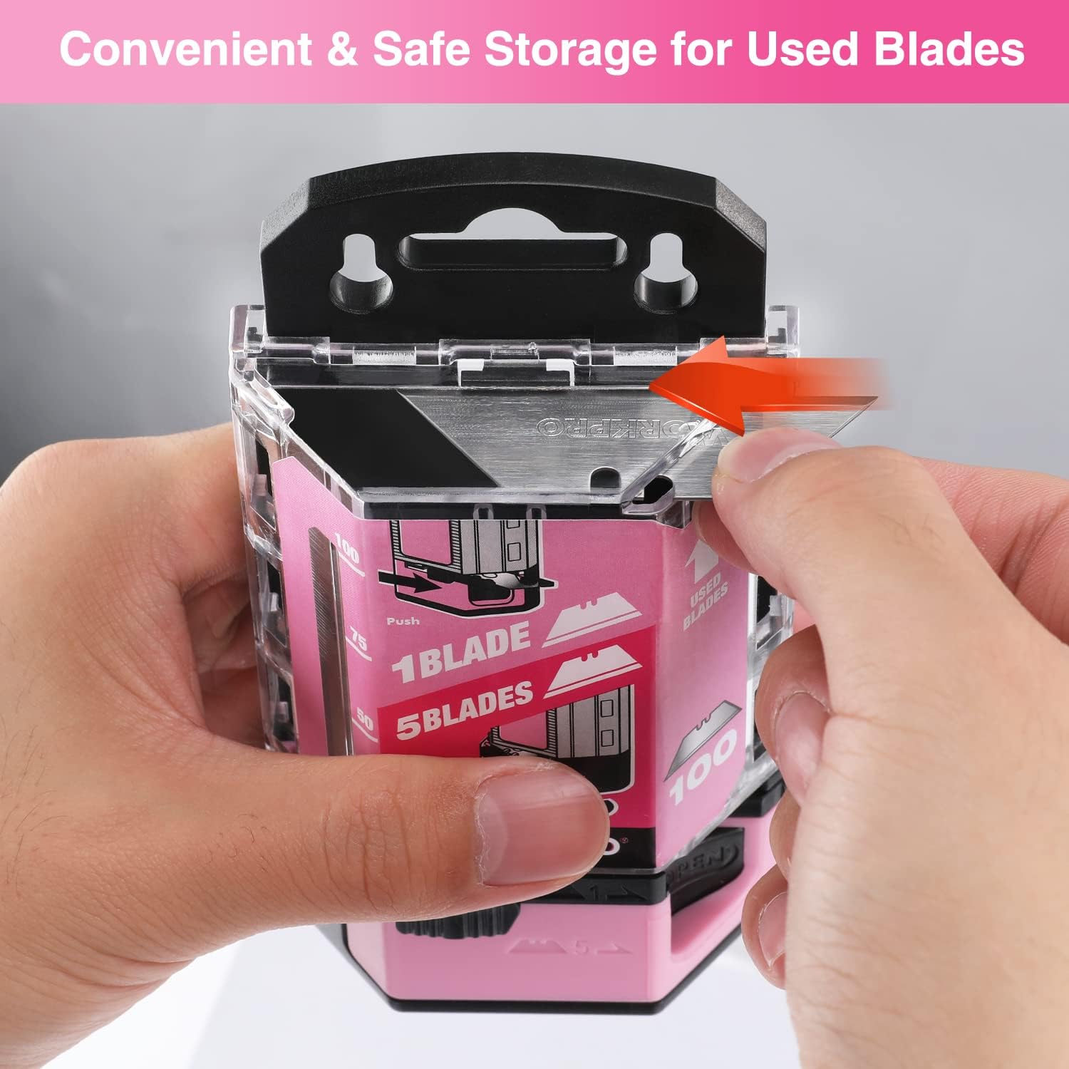 Pink utility knife blade dispenser with clear cover, hands storing used blades