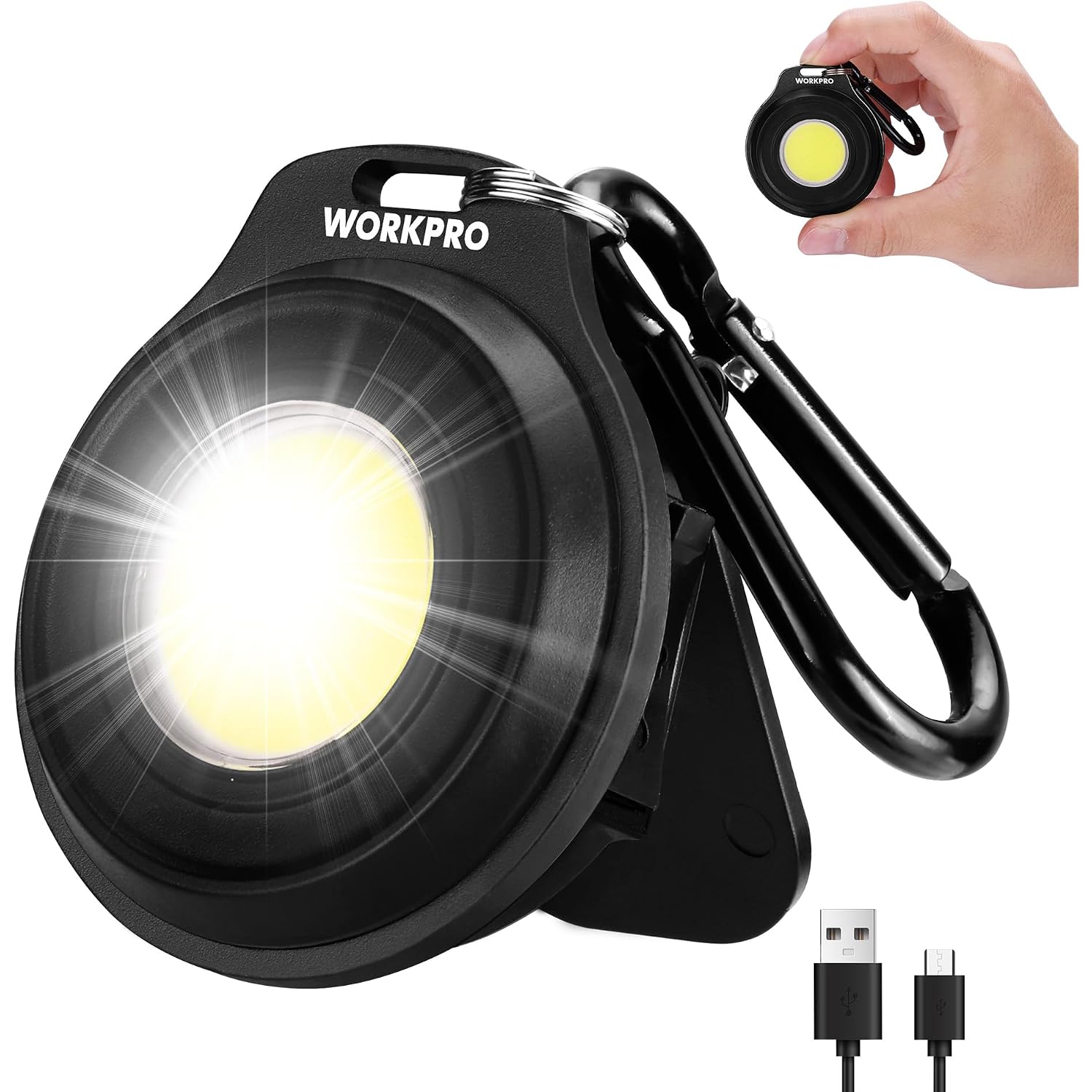 Black COB keychain work light with carabiner, close-up of bright front lens