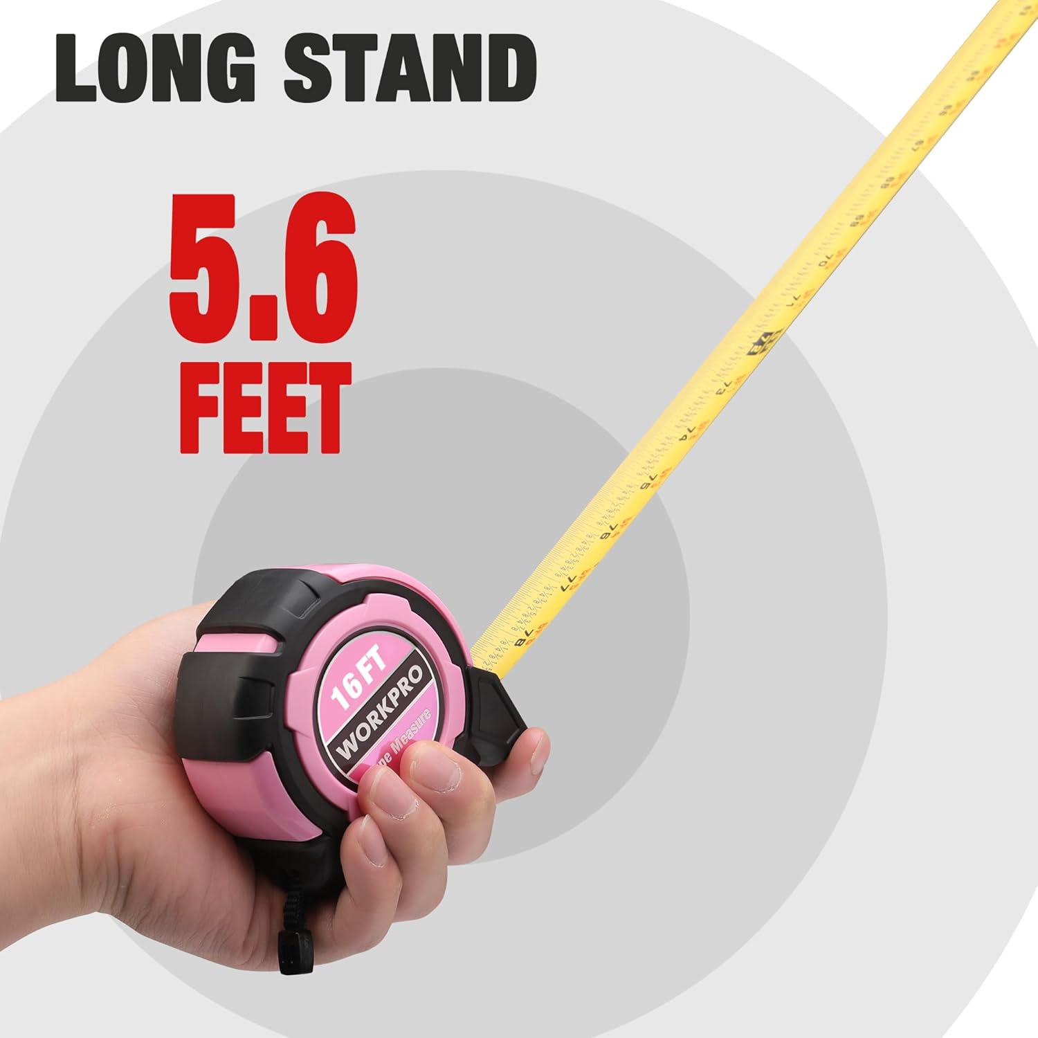 Pink WORKPRO 16FT tape measure held in hand, tape extended to 5.6 feet