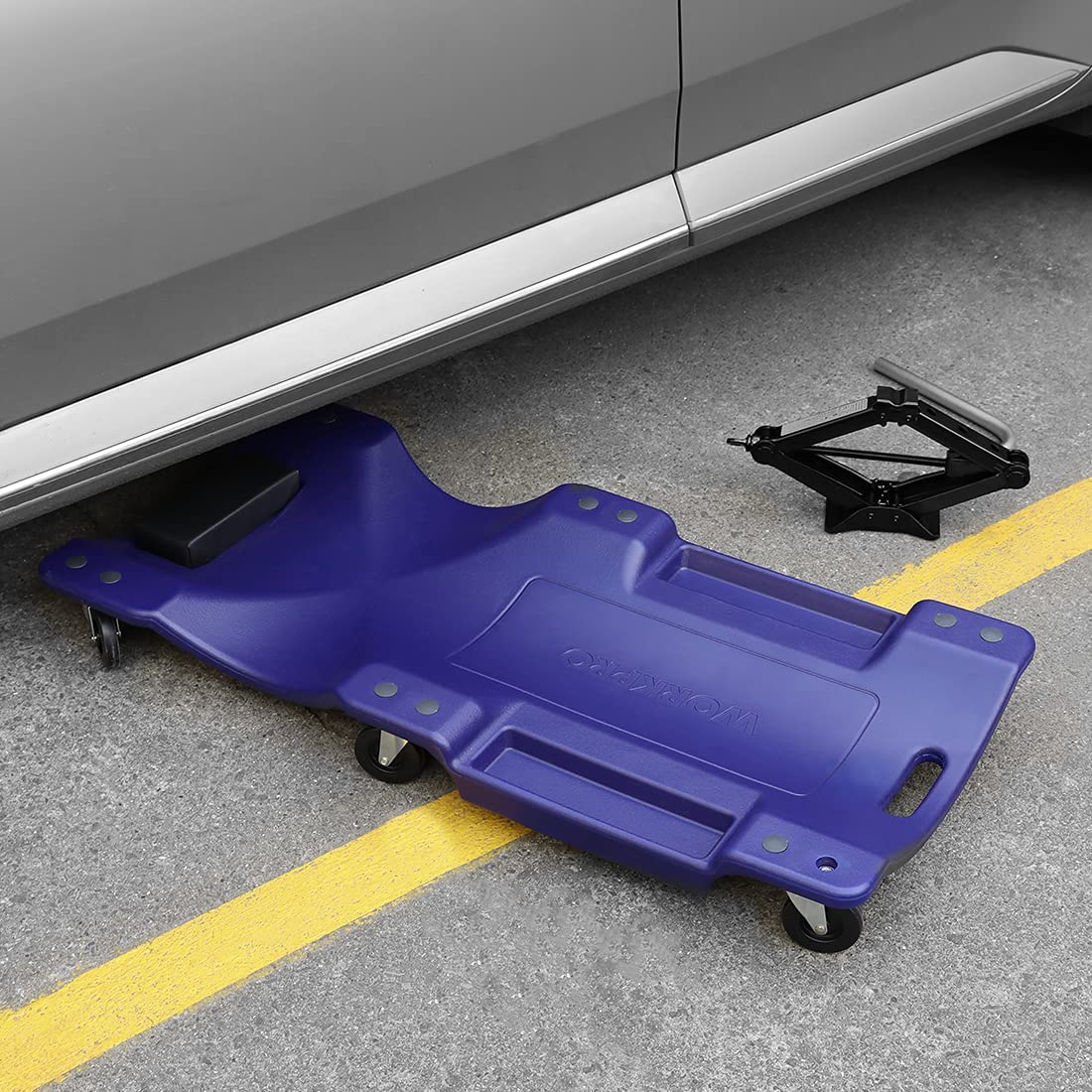 Blue mechanic plastic creeper with carrying handle and rolling caster wheels