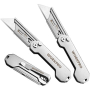 Three folding utility knives with stainless steel blades and pocket clips