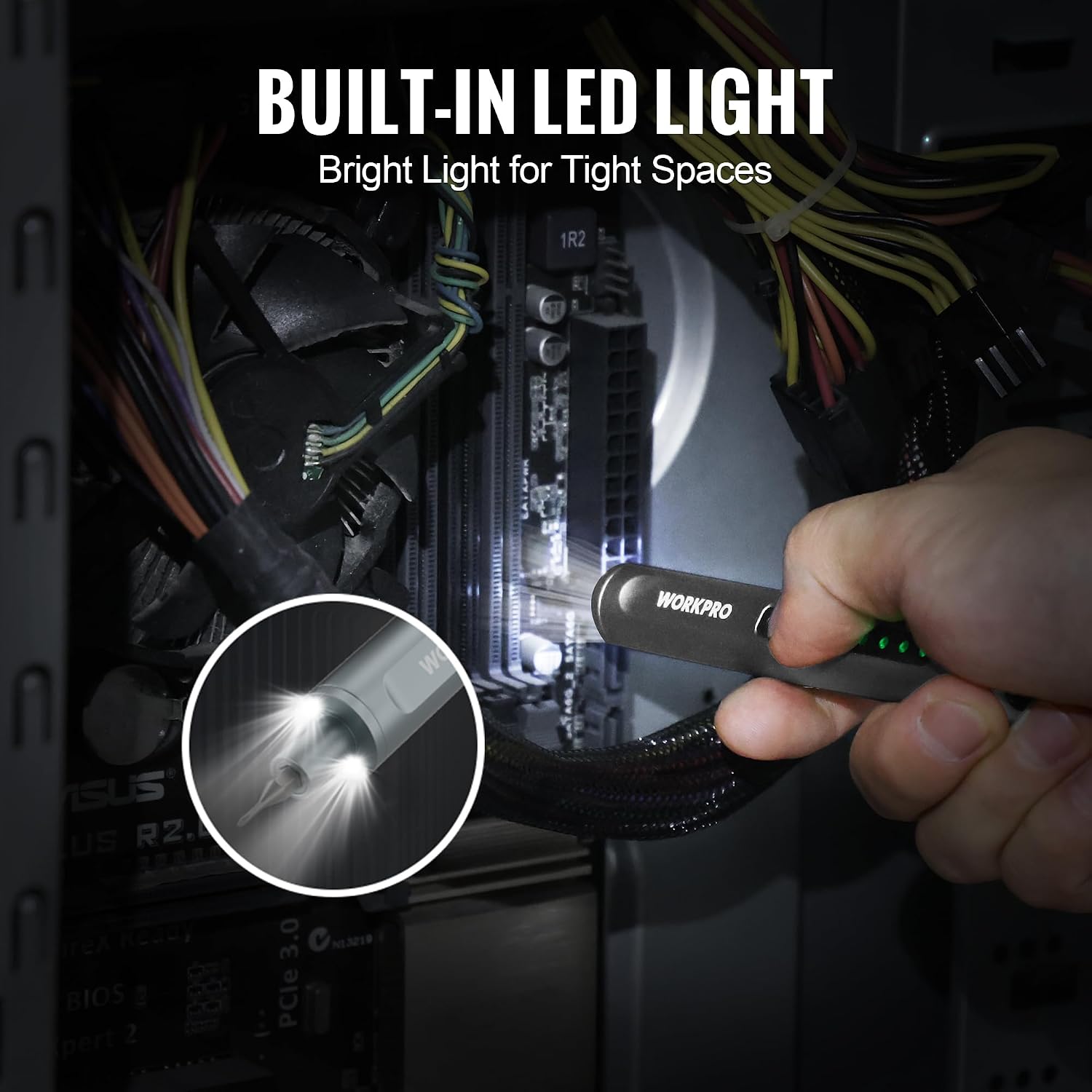 Hand holding precision screwdriver with LED light illuminating a computer circuit board