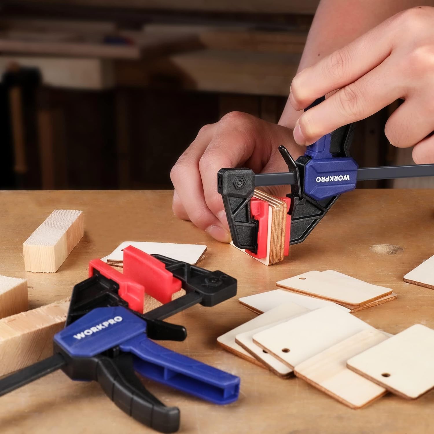 WORKPRO mini bar clamp, blue handle used by hand to clamp wooden pieces
