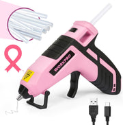 Pink cordless hot glue gun with nozzle, black grip, and mini glue sticks
