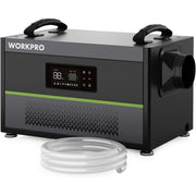 Black dehumidifier with digital display and coiled drain hose included