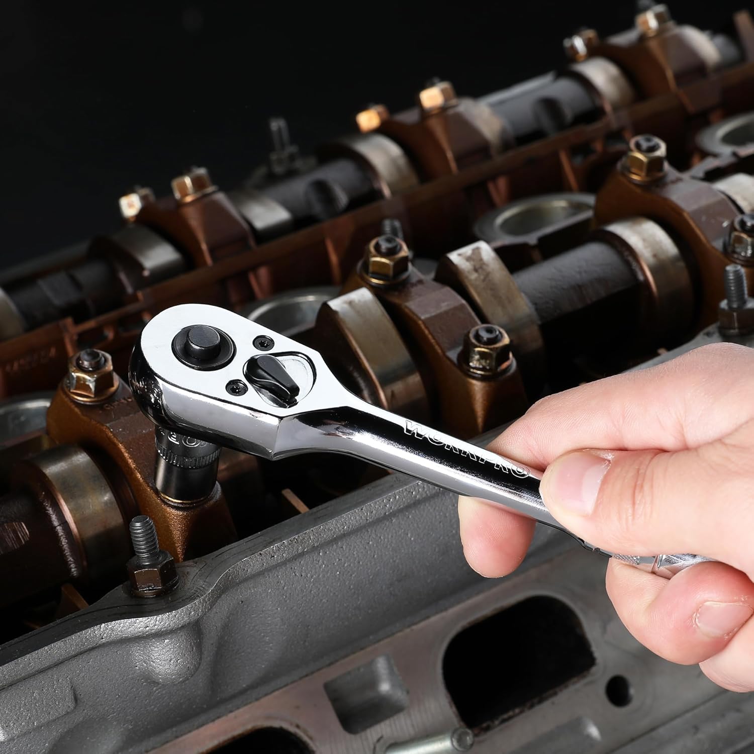 3/8 drive ratchet wrench in a socket set, chrome head and full polish body