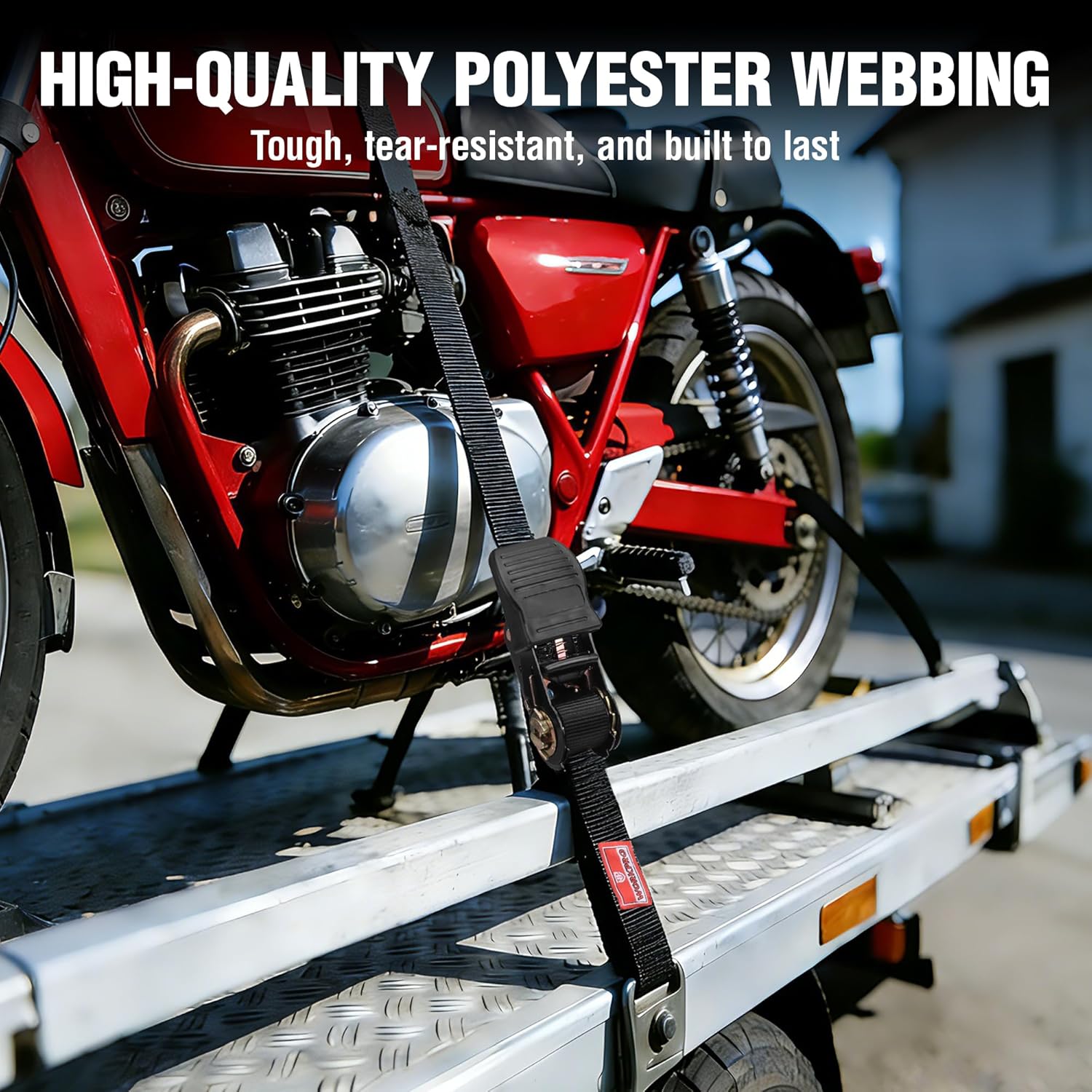 Black polyester webbing ratchet tie down strap on vehicle cargo rack